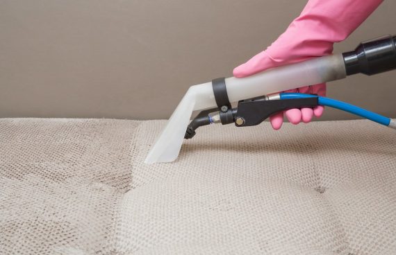 Tile cleaning with a pink glove in Fredrick